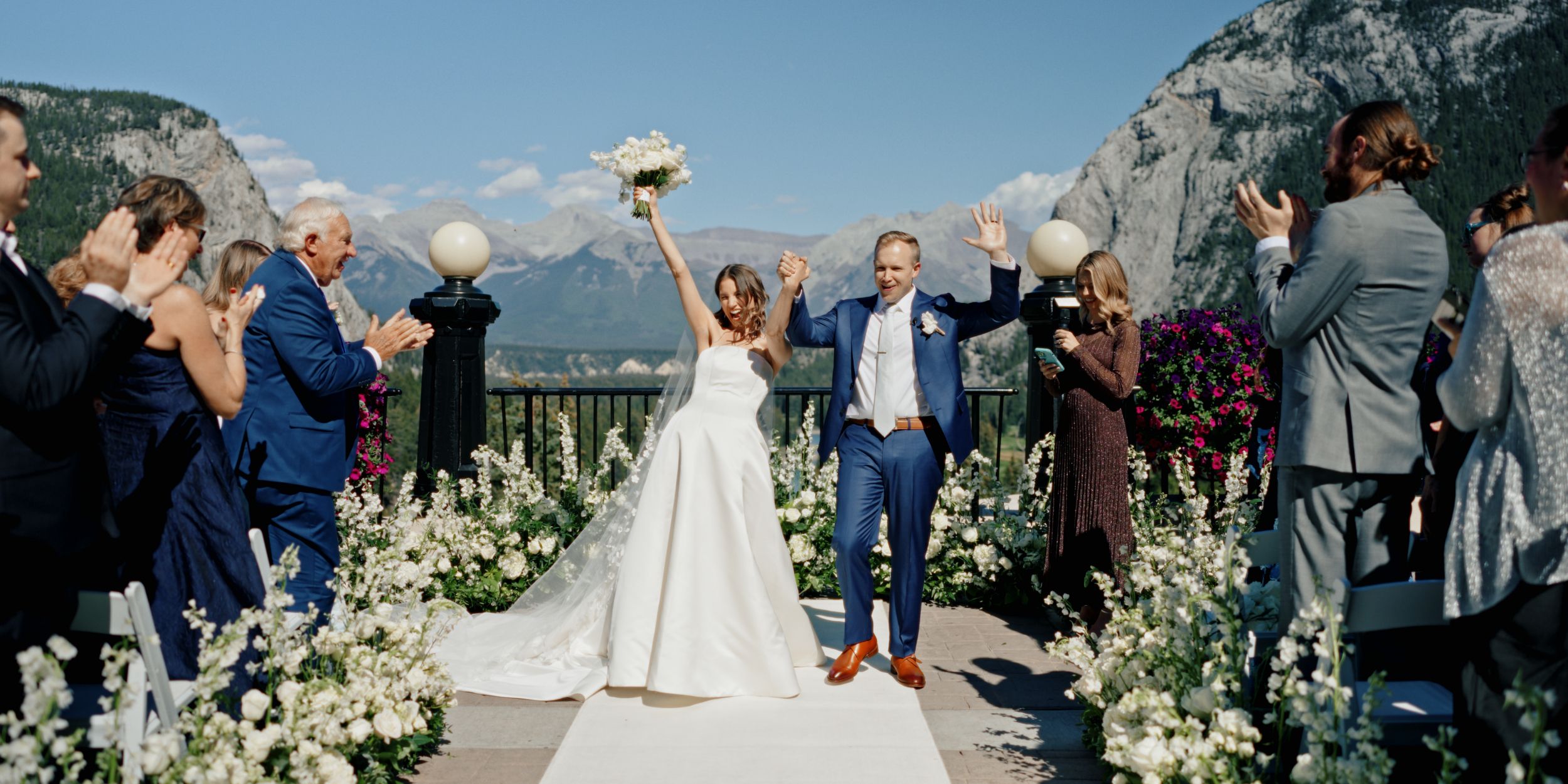 bride and groom at a wedding ceremony at the Fairmont Banff Springs Hotel